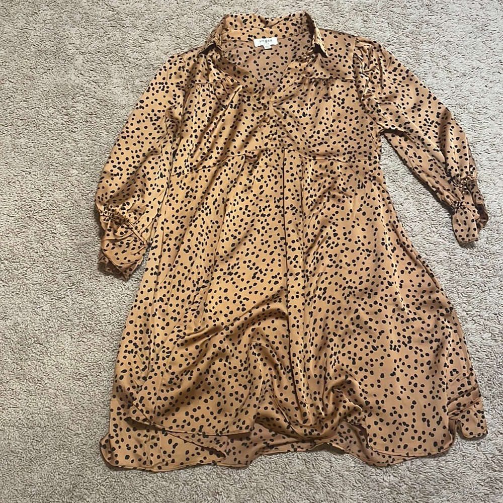 Size Small. Umgee patterned Tunic.
